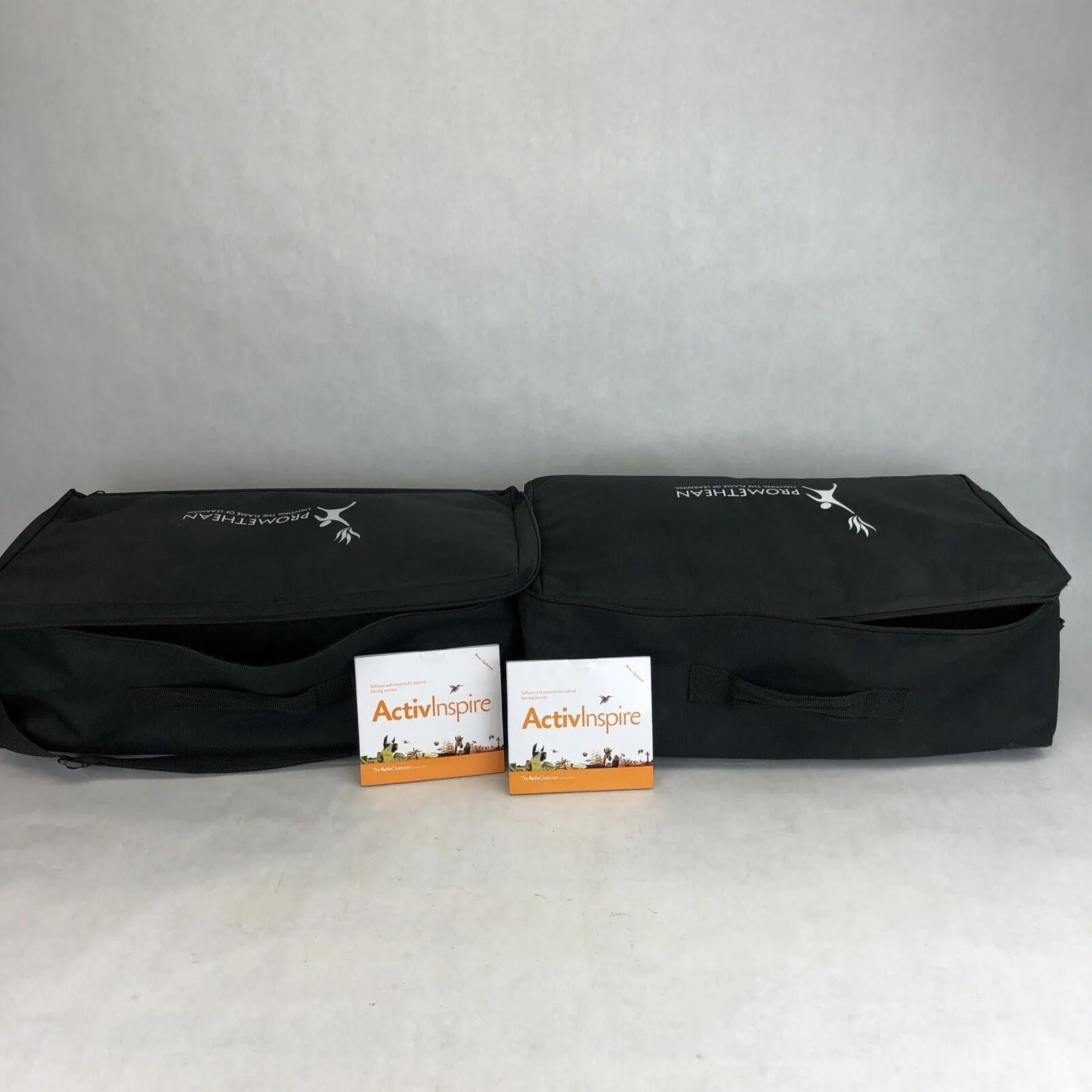 2 Sets of 33 Promethean ActivExpression PRM-AE1-01 Remotes With Carrying Cases